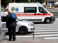 An ambulance is struggling through the traffic in the street of Kyiv, capital of Ukraine, in Kyiv, Ukraine, on June 3, 2024. NO USE RUSSIA....