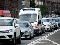 An ambulance is struggling through the traffic in the street of Kyiv, capital of Ukraine, in Kyiv, Ukraine, on June 3, 2024. NO USE RUSSIA....