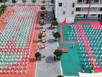 Students are practicing martial arts during a class break at the Second Experimental Primary School in Guanyun County, Lianyungang city, in...