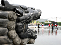 Volunteers are picking up debris at the Black Dragon Cave Scenic spot in Handan, China, on June 4, 2024. (