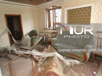 Broken furniture is being seen inside a house following a nighttime Russian missile attack in Dnipro, Ukraine, on June 4, 2024. Ukraine's ai...