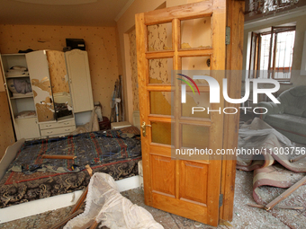 Broken furniture is being seen inside a house following a nighttime Russian missile attack in Dnipro, Ukraine, on June 4, 2024. Ukraine's ai...