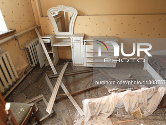 Broken furniture is being seen inside a house following a nighttime Russian missile attack in Dnipro, Ukraine, on June 4, 2024. Ukraine's ai...