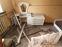 Broken furniture is being seen inside a house following a nighttime Russian missile attack in Dnipro, Ukraine, on June 4, 2024. Ukraine's ai...