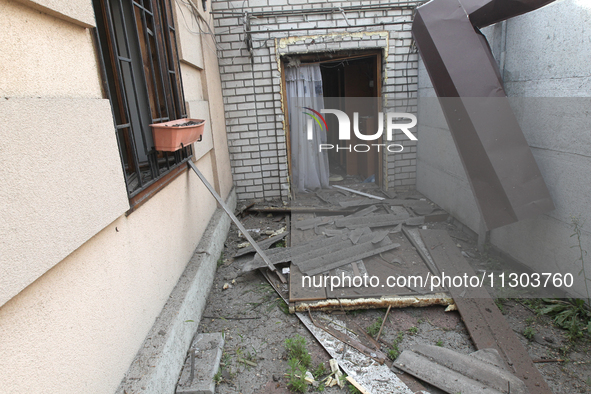 A house is being damaged by the falling debris of downed Russian missiles in Dnipro, Ukraine, on June 4, 2024. Ukraine's air defense forces...