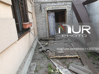 A house is being damaged by the falling debris of downed Russian missiles in Dnipro, Ukraine, on June 4, 2024. Ukraine's air defense forces...