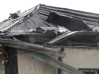 A house is being damaged by the falling debris of downed Russian missiles in Dnipro, Ukraine, on June 4, 2024. Ukraine's air defense forces...