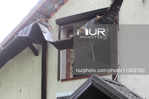 A house is being damaged by the falling debris of downed Russian missiles in Dnipro, Ukraine, on June 4, 2024. Ukraine's air defense forces...