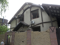 A house is being damaged by the falling debris of downed Russian missiles in Dnipro, Ukraine, on June 4, 2024. Ukraine's air defense forces...