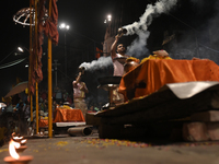 Hindu priests are worshipping during Ganga aarti on the ghats of the river Ganga in Varanasi, India, on June 2, 2024, after the day of Loksa...