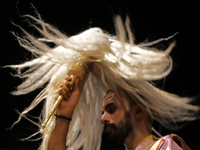 A Hindu priest is worshipping during Ganga aarti on the ghats of the river Ganga after the day of Loksabha Election in Varanasi, India, on J...