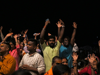 Hindu devotees are praying as they witness Ganga aarti on the ghats of the river Ganga in Varanasi, India, on June 2, 2024, after the day of...