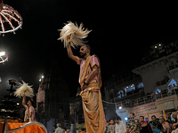 Hindu priests are worshipping during Ganga aarti on the ghats of the river Ganga in Varanasi, India, on June 2, 2024, after the day of Loksa...