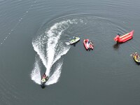 An emergency rescue drill for the 2024 Thousand Island Lake water sports leisure project is taking place in Hangzhou, China, on June 4, 2024...