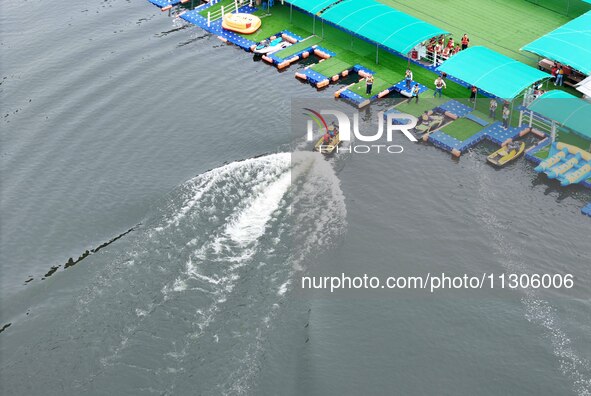 An emergency rescue drill for the 2024 Thousand Island Lake water sports leisure project is taking place in Hangzhou, China, on June 4, 2024...