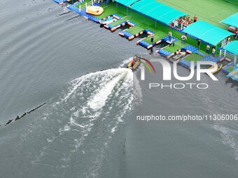 An emergency rescue drill for the 2024 Thousand Island Lake water sports leisure project is taking place in Hangzhou, China, on June 4, 2024...