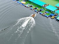 An emergency rescue drill for the 2024 Thousand Island Lake water sports leisure project is taking place in Hangzhou, China, on June 4, 2024...