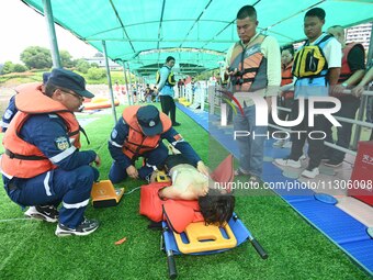 An emergency rescue drill for the 2024 Thousand Island Lake water sports leisure project is taking place in Hangzhou, China, on June 4, 2024...