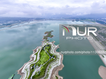 The water level in front of the Three Gorges Reservoir is falling to 145.56 meters above sea level in Yichang, China, on June 5, 2024. The T...