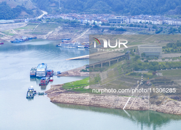 The water level in front of the Three Gorges Reservoir is falling to 145.56 meters above sea level in Yichang, China, on June 5, 2024. The T...