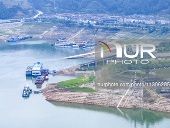 The water level in front of the Three Gorges Reservoir is falling to 145.56 meters above sea level in Yichang, China, on June 5, 2024. The T...