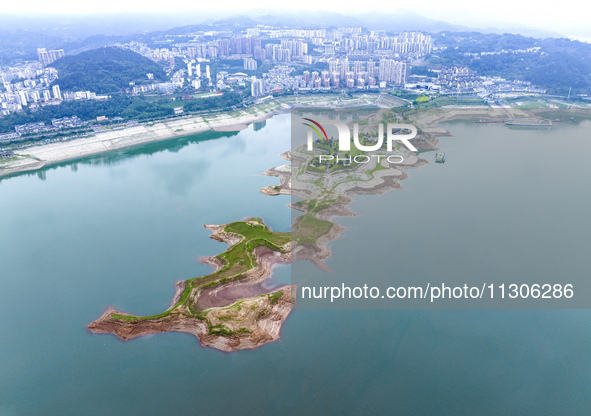 The water level in front of the Three Gorges Reservoir is falling to 145.56 meters above sea level in Yichang, China, on June 5, 2024. The T...