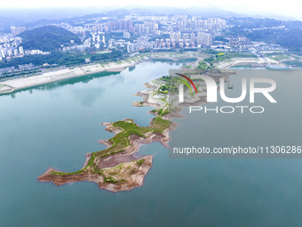 The water level in front of the Three Gorges Reservoir is falling to 145.56 meters above sea level in Yichang, China, on June 5, 2024. The T...