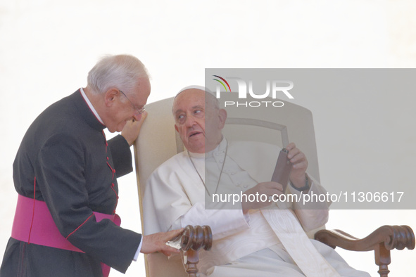 Pope Francis is leading the weekly general audience in Saint Peter's Square, Vatican City, on June 5, 2024. 