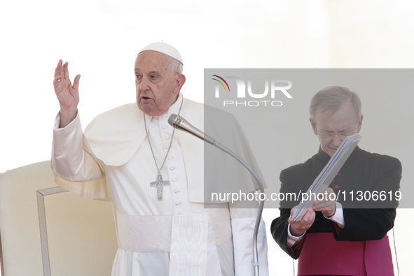 Pope Francis is leading the weekly general audience in Saint Peter's Square, Vatican City, on June 5, 2024. 