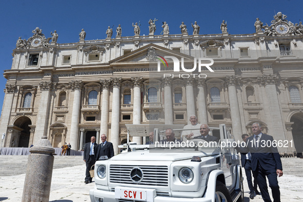 Pope Francis is leaving at the end of his weekly general audience in St. Peter's Square, at the Vatican, on June 5, 2024. 