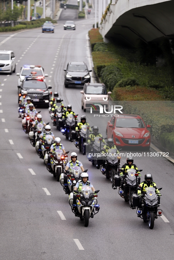 Chinese police are escorting the National College Entrance Examination in Wuhu, Anhui province, China, on June 5, 2024. 