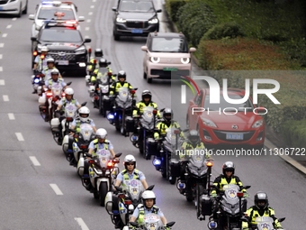 Chinese police are escorting the National College Entrance Examination in Wuhu, Anhui province, China, on June 5, 2024. (