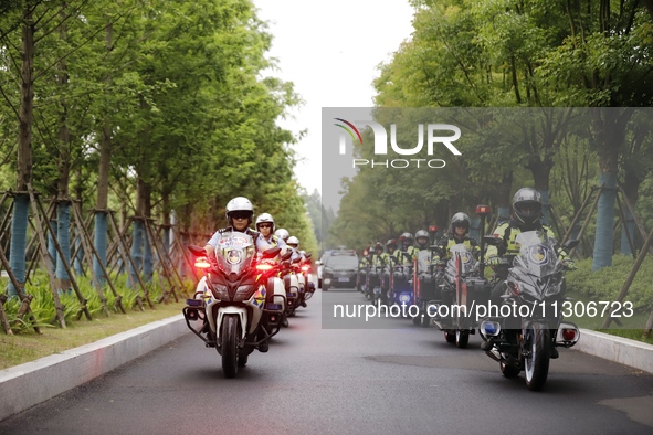 Chinese police are escorting the National College Entrance Examination in Wuhu, Anhui province, China, on June 5, 2024. 