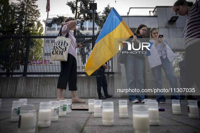 A dozen Ukrainian nationals rally in front of the US embassy in Warsaw, Poland on 04 June, 2024. The rally, organized by a group called ''To...