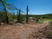 Tornado damage is being seen following the EF-3, EF-2, and EF-1 tornadoes that are impacting the city and local communities on Memorial Day...