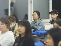 A teacher is teaching students how to make short videos in a classroom in Hangzhou, China, on June 5, 2024. (