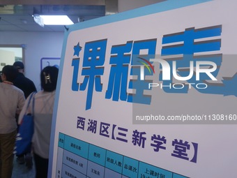 Students are walking into a school to learn new skills in Hangzhou, China, on June 5, 2024. (