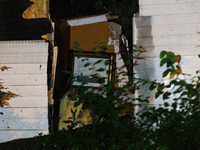 A painting is seen inside a home on Dogwood Drive in Gaithersburg, Maryland that was split in half by a fallen tree on June 5, 2024, after a...