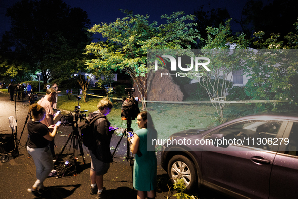 A fallen tree rests in a home on Dogwood Drive in Gaithersburg, Maryland on June 5, 2024, after a tornado swept through the region. 