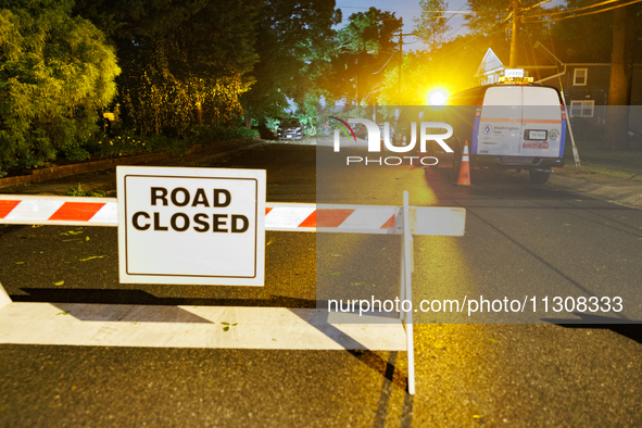 A crew from Washington Gas work on repairs in a Gaithersburg, Maryland neighborhood on June 5, 2024, after a tornado swept through the city....