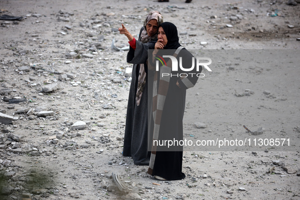 Palestinians are gathering at a UN-school that was hit during Israeli bombardment in Nuseirat, in the central Gaza Strip, on June 6, 2024, a...