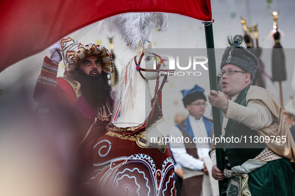 Lajkonik, a folklore symbol of Krakow,dances during the Lajkonik March in the Old Town of Krakow, Poland on June 6, 2024. Centuries long tra...