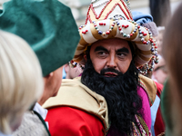 Lajkonik, a folklore symbol of Krakow, walks in a parade during the Lajkonik March in the Old Town of Krakow, Poland on June 6, 2024. Centur...