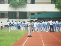 Candidates are waiting outside a test site for the National College Entrance examination in Hangzhou, China, on June 7, 2024. (