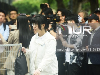 Candidates are walking into a college entrance exam in Hangzhou, Zhejiang province, China, on June 7, 2024. (