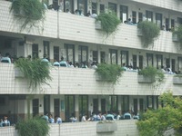 Candidates are waiting outside a test site for the National College Entrance examination in Hangzhou, China, on June 7, 2024. (