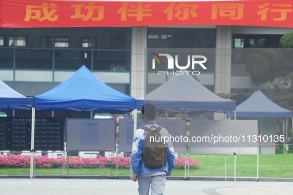 Candidates are walking into a college entrance exam in Hangzhou, Zhejiang province, China, on June 7, 2024. 