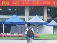 Candidates are walking into a college entrance exam in Hangzhou, Zhejiang province, China, on June 7, 2024. (