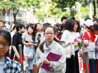 Candidates are starting to enter the test room at the entrance examination point of Nanjing Tianjiabing Senior High School in Nanjing, China...