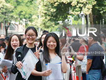 Candidates are starting to enter the test room at the entrance examination point of Nanjing Tianjiabing Senior High School in Nanjing, China...